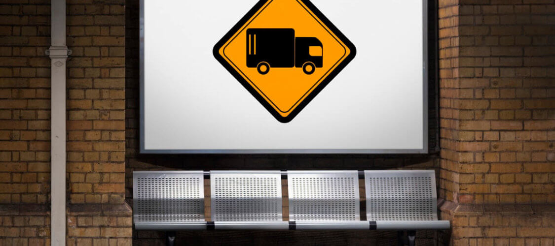 sign displaying a graphic of a lorry